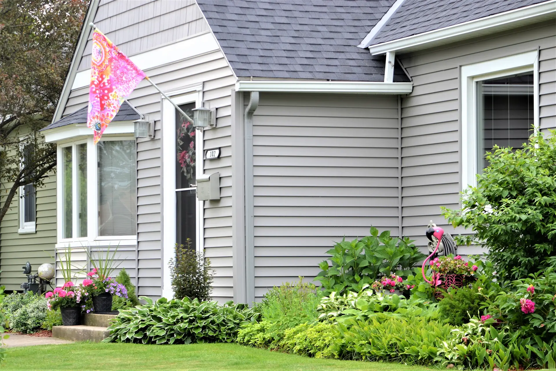 Residential home with professional roofing and landscaping